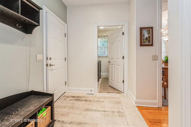 interior space with light wood-style flooring and baseboards