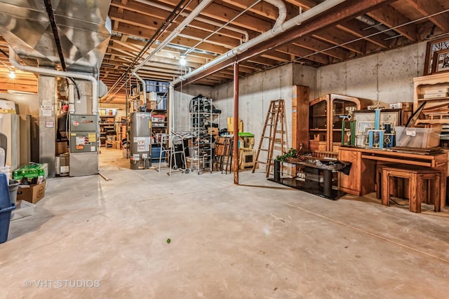 unfinished below grade area featuring gas water heater