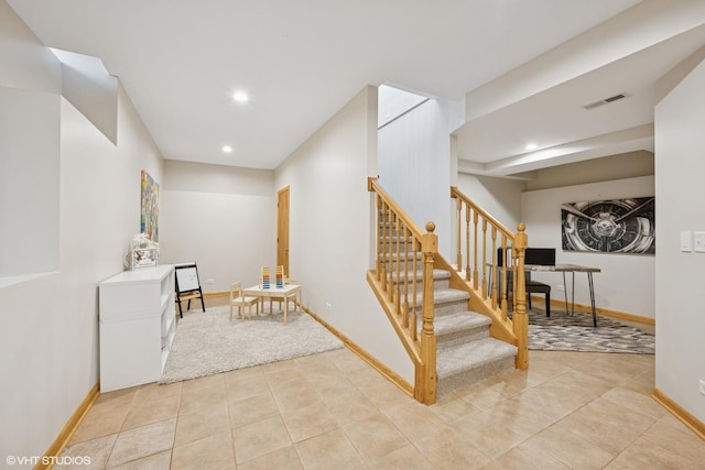 interior space with recessed lighting, tile patterned flooring, visible vents, and baseboards