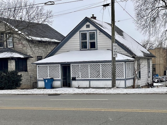 view of front of property featuring a chimney