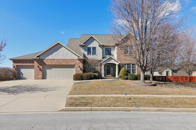 view of front of house featuring an attached garage, fence, concrete driveway, and brick siding