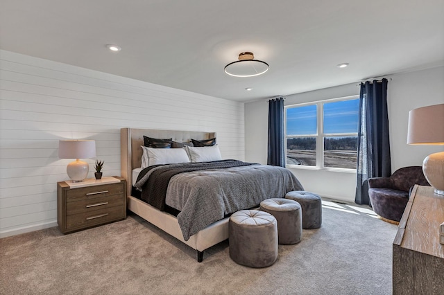 bedroom featuring light colored carpet