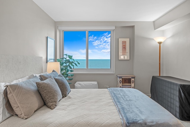 bedroom with a water view