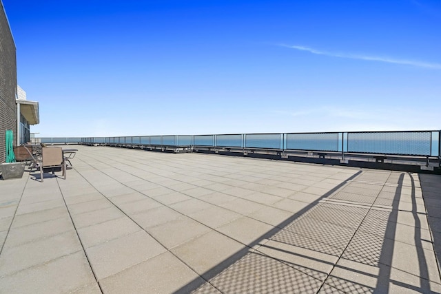 view of patio / terrace featuring a water view