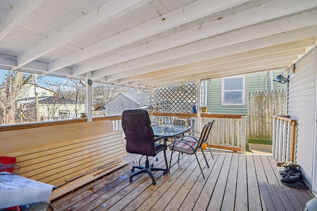 wooden deck with outdoor dining space