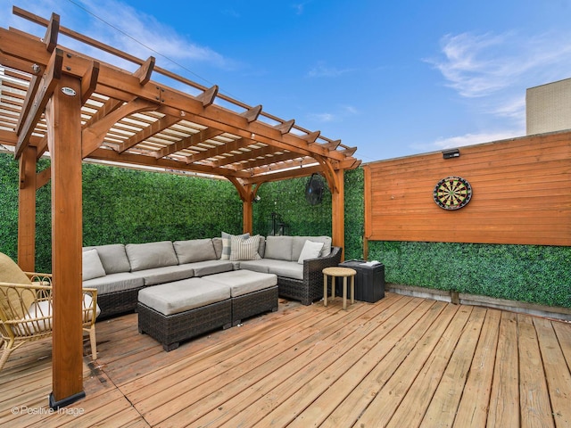 wooden terrace with an outdoor living space and a pergola