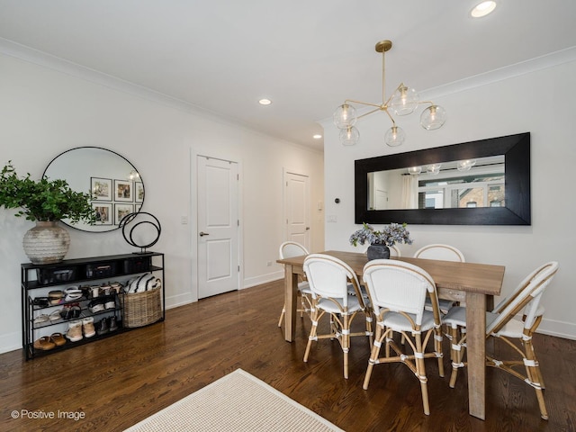 dining space featuring baseboards, recessed lighting, wood finished floors, and crown molding