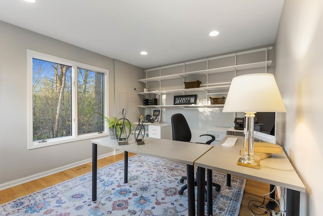 home office featuring recessed lighting, baseboards, and wood finished floors