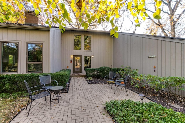 exterior space with a patio area and a chimney