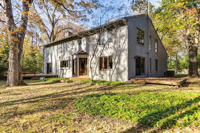 view of front of property with a front lawn and a chimney