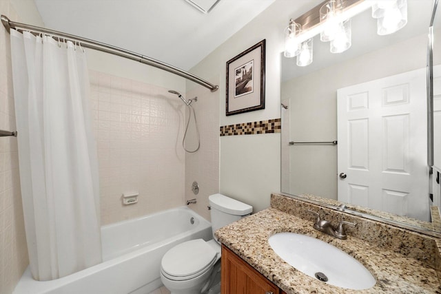 bathroom featuring toilet, shower / bath combo, and vanity