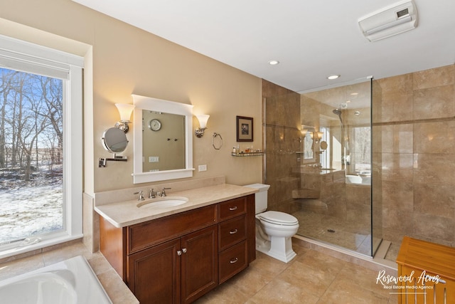 bathroom with toilet, visible vents, walk in shower, and vanity