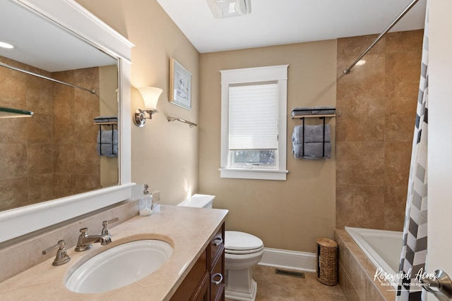 bathroom featuring baseboards, visible vents, toilet, tile patterned flooring, and vanity