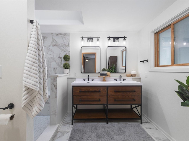 full bathroom with a walk in shower, marble finish floor, a sink, and double vanity