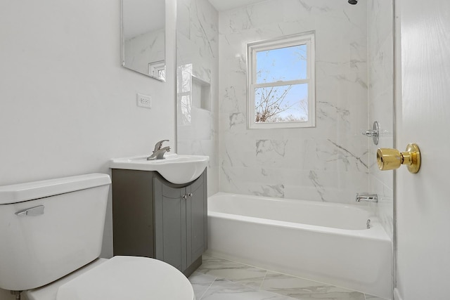 bathroom with toilet, marble finish floor, washtub / shower combination, and vanity