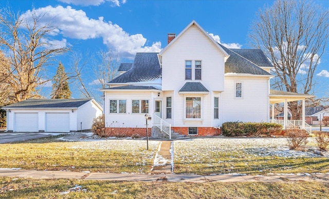 view of front facade featuring roof with shingles, a front lawn, a chimney, and an outdoor structure