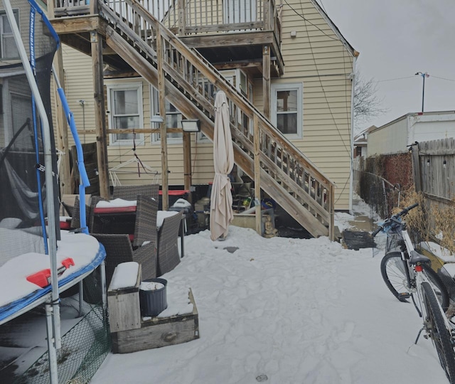 exterior space featuring stairs and fence