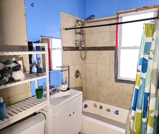 bathroom featuring shower / bath combo and a sink