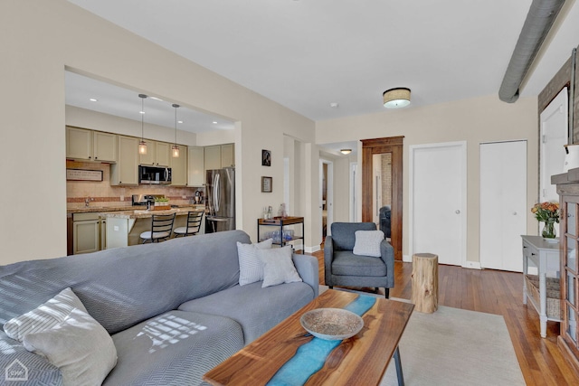 living room featuring dark wood-type flooring