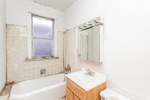 full bathroom with a bathtub and vanity