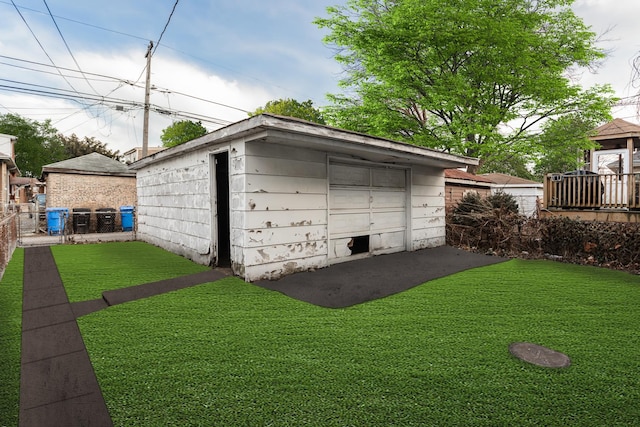 garage featuring fence