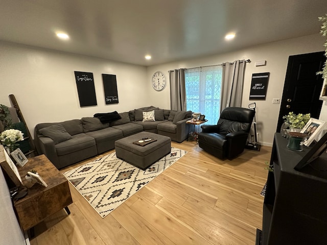 living room featuring recessed lighting and light wood finished floors