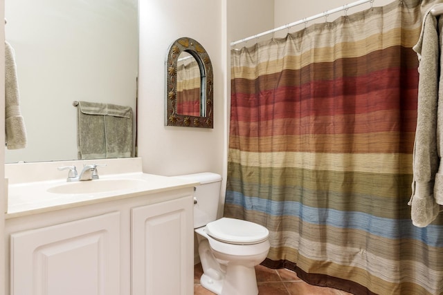 bathroom with toilet, tile patterned flooring, a shower with shower curtain, and vanity