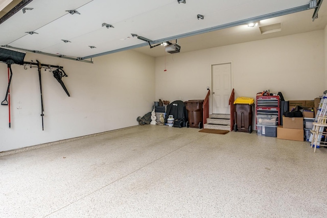 garage featuring a garage door opener