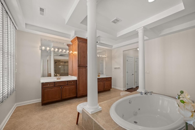 bathroom with decorative columns, visible vents, and two vanities