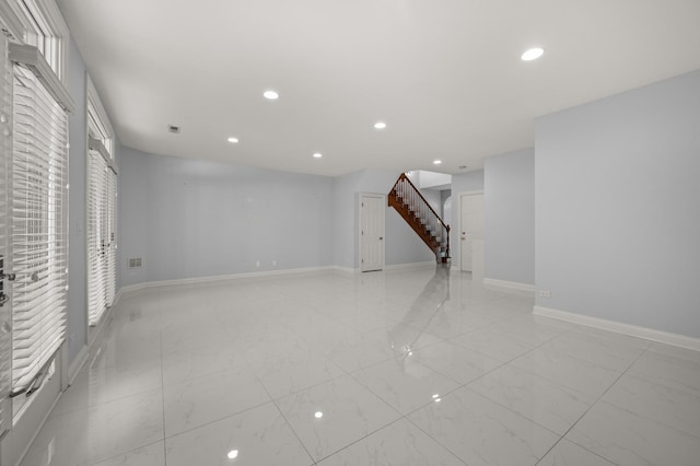 interior space featuring stairs, recessed lighting, visible vents, and baseboards