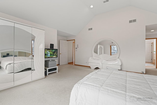 bedroom featuring high vaulted ceiling, baseboards, visible vents, and carpet flooring