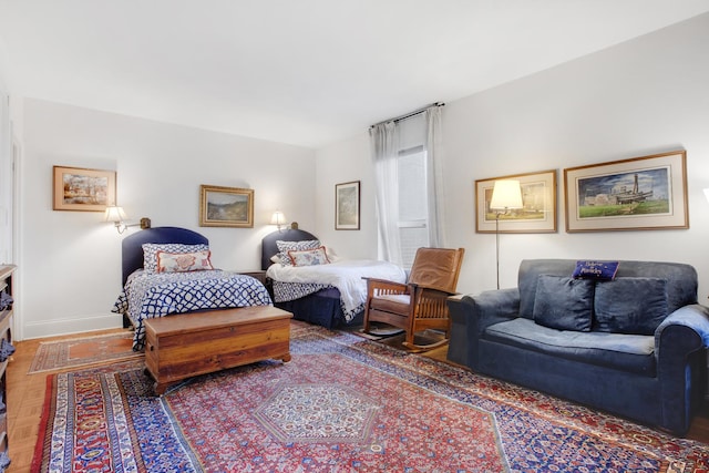 bedroom featuring baseboards