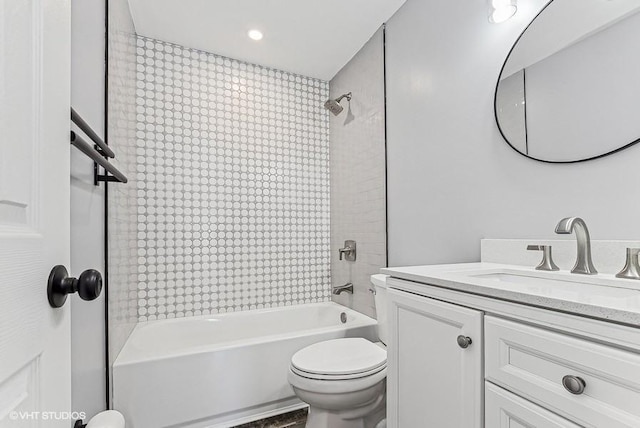 bathroom featuring shower / bath combination, vanity, and toilet