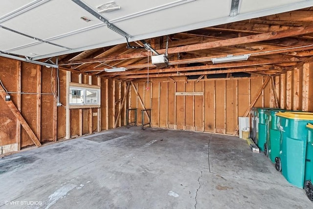 garage featuring a garage door opener