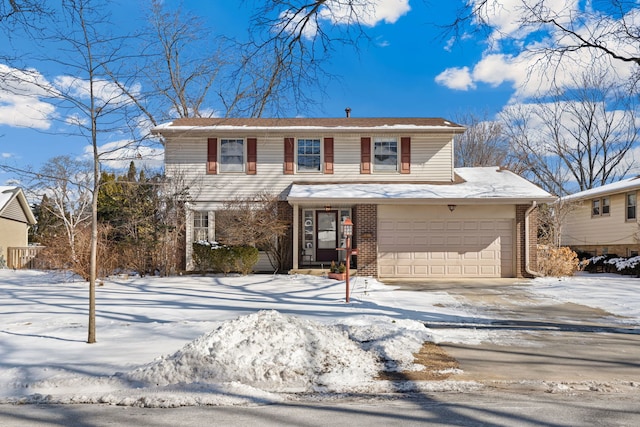 traditional home featuring brick siding and driveway