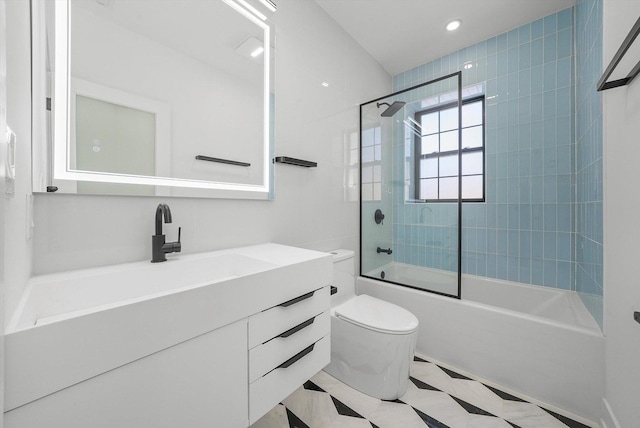 full bathroom with toilet, recessed lighting, combined bath / shower with glass door, and vanity