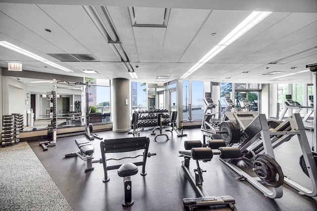 workout area featuring a wall of windows