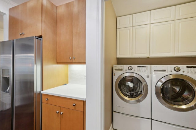 laundry area featuring laundry area and washer and clothes dryer