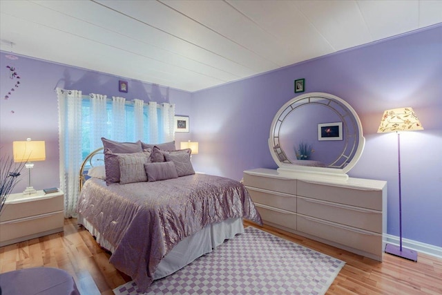 bedroom with light wood-type flooring