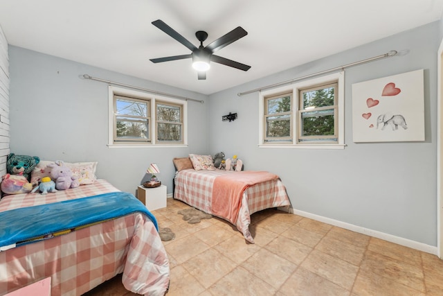 26980 N Pierre Dr, Mundelein, IL 60060 - bedroom featuring baseboards and a ceiling fan