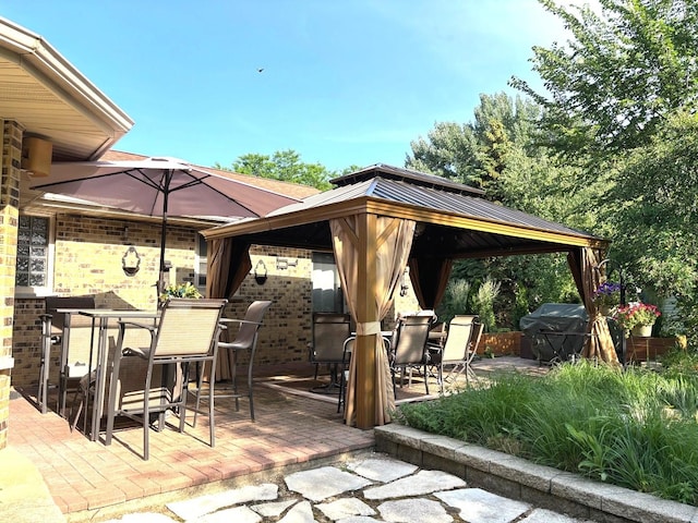 26980 N Pierre Dr, Mundelein, IL 60060 - view of patio featuring a gazebo and outdoor dining area