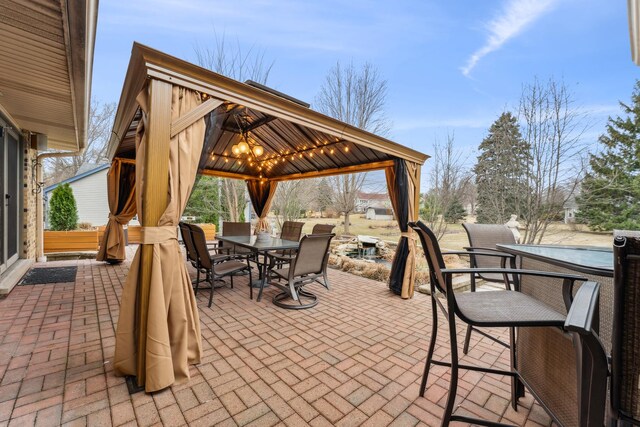 26980 N Pierre Dr, Mundelein, IL 60060 - view of patio / terrace featuring a gazebo and outdoor dining area
