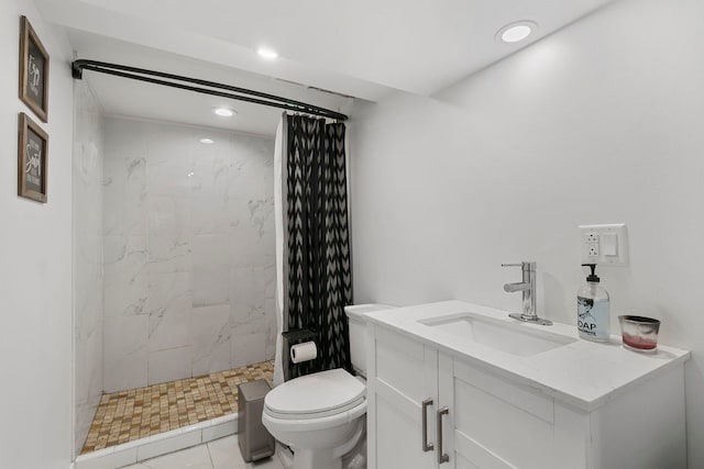 bathroom featuring toilet, a shower stall, recessed lighting, and vanity