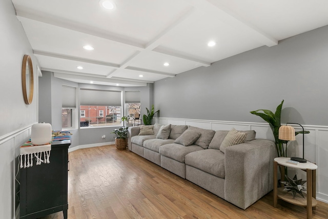 living room with recessed lighting, wainscoting, wood finished floors, coffered ceiling, and beamed ceiling