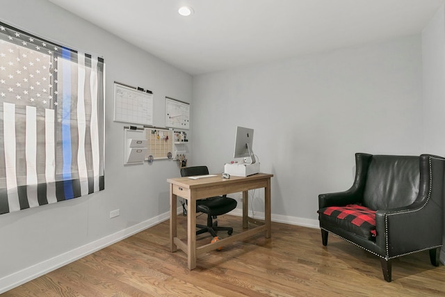 home office featuring recessed lighting, wood finished floors, and baseboards