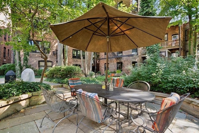 view of patio with outdoor dining area