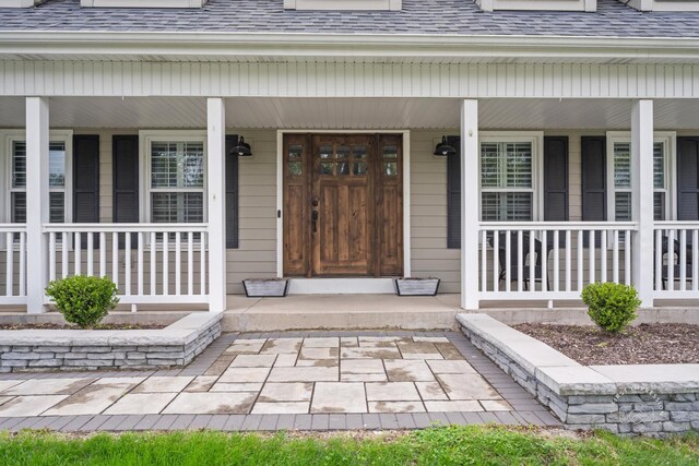 322 Arlington Ave, Naperville, IL 60565 - entrance to property featuring roof with shingles and a porch
