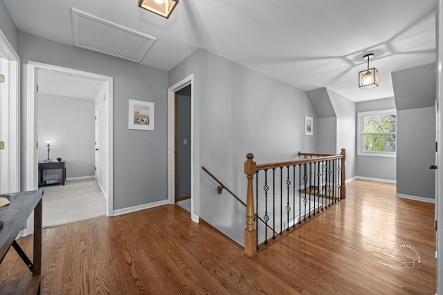 322 Arlington Ave, Naperville, IL 60565 - hall featuring an upstairs landing, wood finished floors, baseboards, and attic access