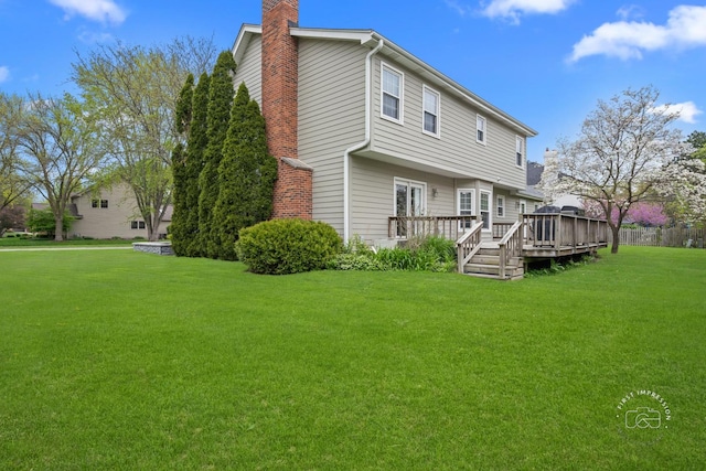 322 Arlington Ave, Naperville, IL 60565 - back of house with a chimney, a deck, and a yard