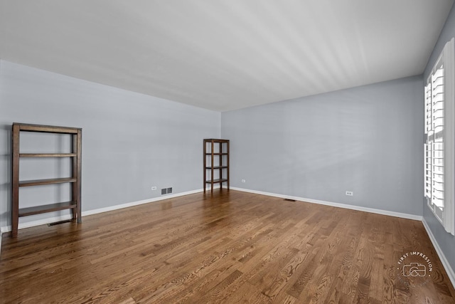 322 Arlington Ave, Naperville, IL 60565 - empty room featuring wood finished floors and baseboards